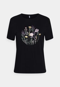 Camiseta de algodón negra con un diseño de bordado floral colorido, que presenta diversas flores y hojas dispuestas en un patrón circular.