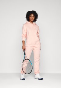 Björn Borg ESSENTIAL PANTS - Treniņtērpa apakšdaļas - apricot blush