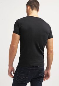 LOGOSHIRT LOONEY TUNES TROUBLE MAKER - Print T-shirt - black