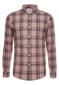 Jasnoróżowa koszula w kratę z długimi rękawami, kołnierzykiem zapinanym na guziki, białymi guzikami i delikatnie teksturowaną tkaniną. Posiada czarne i ciemnofioletowe linie kratki.