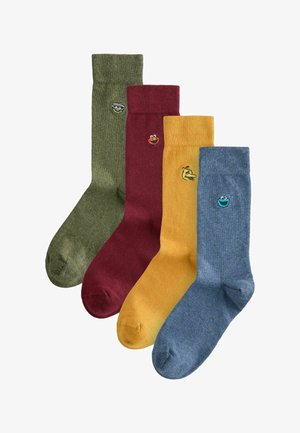 Set of four crew socks featuring green, burgundy, yellow, and blue colors, each with distinct cartoon character embroidery on the upper.