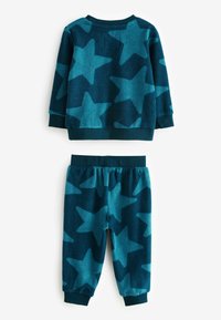 Fleece-Schlafanzugset in dunkeltürkis mit Sternmuster. Das Oberteil hat gerippte Bündchen, die Hose verfügt über einen elastischen Bund und ein ähnliches Sternenmotiv.