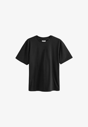 T-shirt nera a maniche corte in cotone, con colletto tondo e texture liscia. Nessun motivo o grafica visibile.