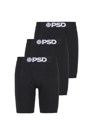 Tre paia di boxer aderenti neri del marchio PSD con logo bianco sulla fascia in vita, disposti a pila sfalsata.
