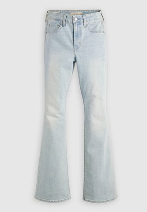 Lys blå høytlivs denimjeans med knapp- og glidelåslukking, lommer foran og bak, og lett utsvingte ben.
