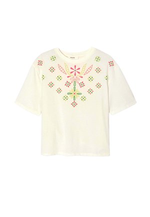 Haut blanc à manches courtes avec des motifs floraux brodés colorés en rose, vert et jaune autour de l'encolure et sur la partie haute de la poitrine.