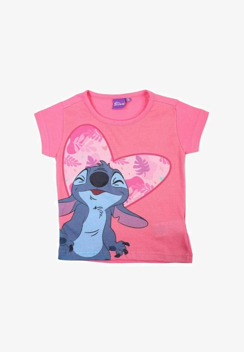 T-shirt en coton rose avec un motif de personnage aux accents gris et bleus, encadré par un grand motif de cœur rose. Encolure ronde, manches courtes.