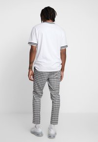 River Island Tygbyxor - black