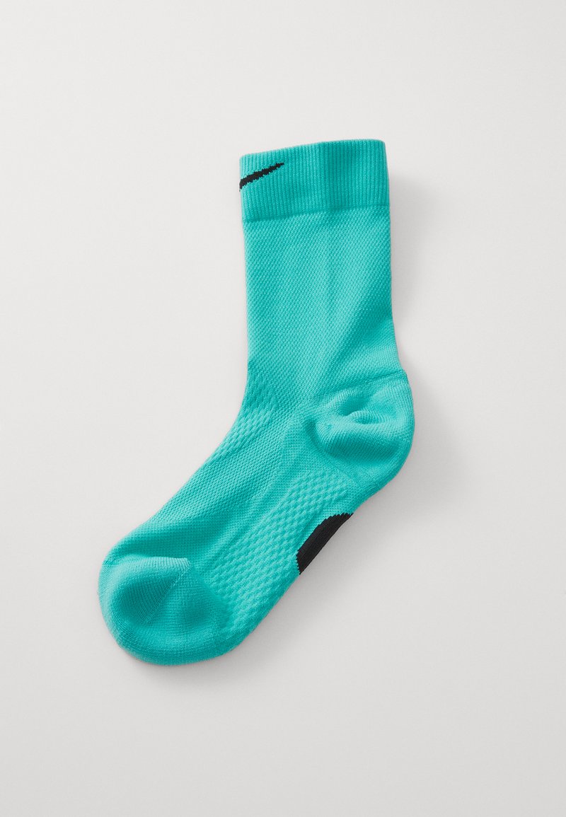 Türkise Socke mit strukturiertem Muster, Rippbündchen und schwarzem Swoosh-Logo an der Seite. Entworfen für Komfort und Passform.