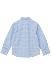 Hellblaues Langarmhemd mit einem dezenten Muster aus kleinen dunklen Punkten. Mit Knopfmanschetten und klassischem Kragen. Glatte Stofftextur.