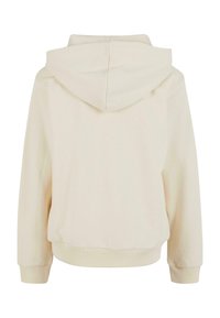 Hoodie i mjuk krämfärgad tyg, med en huva, ribbade muddar och nederkant. Enkel design med avslappnad passform och inga synliga mönster eller detaljer.