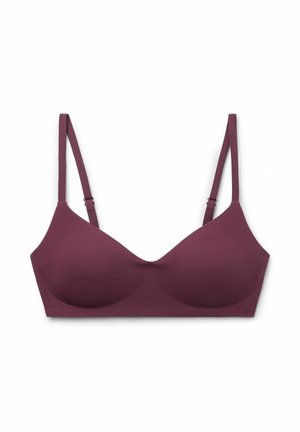 Soutien-gorge rembourré sans fil en mauve foncé avec bretelles fines réglables et bonnets lisses sans coutures.