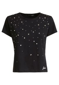 Camiseta de algodón negra con mangas cortas, que presenta strass cuadrados y redondos esparcidos. Incluye el logotipo bordado de "Guess" en la parte inferior.