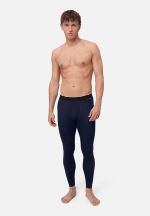 Námořnické modré termo legíny s černým elastickým pasem, hladkým povrchem a švy probíhajícími po stranách.