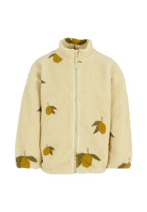 Veste en polaire crème avec un col haut, fermeture éclair intégrale et motifs de citron en jaune et vert. Finition douce et texturée.