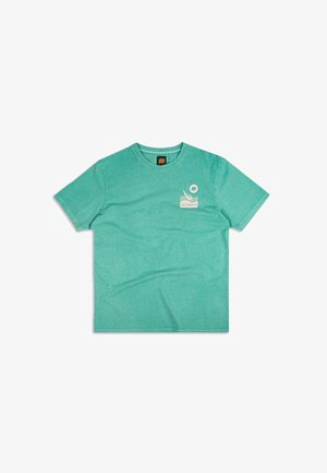 Mint green cotton t-shirt with short sleeves, round neckline, and a small graphic logo on the chest pocket area. Smooth texture.
