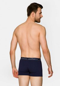 Ciemnoniebieskie bokserki wykonane z elastycznej tkaniny. Posiadają markowy elastyczny pas z napisem i dopasowany krój. Zapewniają komfort noszenia.