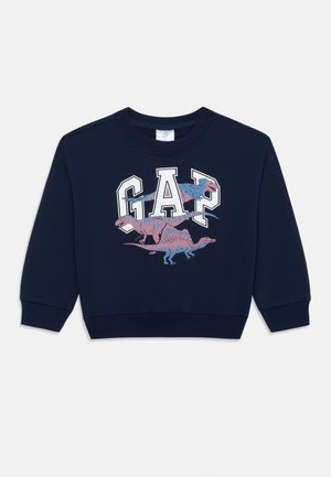 Sweat à capuche bleu marine avec le logo GAP et trois illustrations de dinosaures colorés sur la poitrine, doté de poignets et d'un ourlet côtelés.