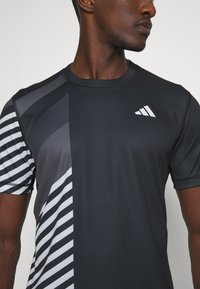 adidas Performance HEAT.RDY FREELIFT - T-shirt print - black
