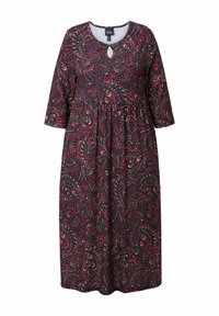 Pitkä musta mekko, jossa on punainen, sininen ja vihreä paisley-kuvio. Mekossa on pyöreä pääntie ja kolmanneksimittaiset hihat. Pehmeää kangasta.