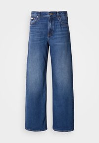 Jeans w szerokich nogawkach w ciemnym niebieskim kolorze, z wysokim stanem, pięcioma kieszeniami i subtelnym przecieraniem z przodu, które dodaje tekstury i szczegółów.