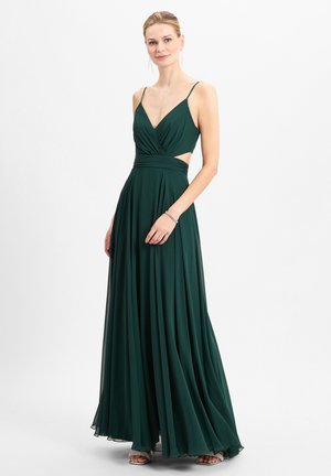 Dunkelgrünes, bodenlanges Kleid mit V-Ausschnitt, Spaghettiträgern, seitlichem Cut-out und fließendem Stoff. Es hat eine taillierte Taille und einen gefalteten Rock.