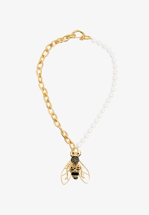 Gold chain necklace featuring a black and gold bee pendant with crystal accents, interspersed with white pearls, creating a unique design.