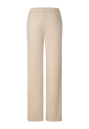 Beżowe, szerokie spodnie z elastycznym pasem, wyposażone w dwie boczne kieszenie i gładką, miękką fakturę. Idealne dla wygody i wszechstronności.