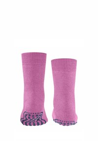 Rosa gestrickte Socken mit gerippten Bündchen, die strukturierte blaue Grip-Punkte an den Sohlen für besseren Halt aufweisen.