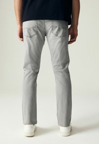 Next AUTHENTIC - Kitsenevad teksad - pale grey