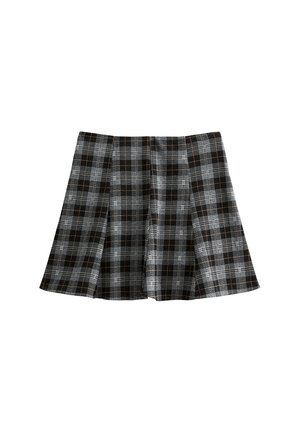 Jupe à carreaux noir et blanc avec des plis, présentant un tissu texturé et un design évasé. Accentuée de lignes brunes subtiles dans le motif.