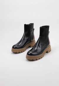 Bryan Stepwise Botines con plataforma - black