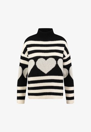 Czarny i biały sweter w paski z kołnierzem typu mock, z dużymi wzorami serc na środku i na rękawach. Miękka faktura i luźny krój.