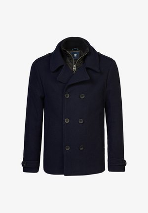 Căciulă marină de culoare bleumarin cu nasturi dubli, guler mare și căptușeală matlasată. Prezintă o croială ajustată și manșete cu nasturi.