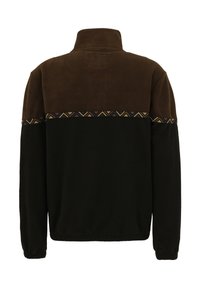 Giacca pullover in pile marrone e nero con una striscia a motivo geometrico, colletto alto e polsini elastici. Tessuto morbido, vestibilità rilassata.
