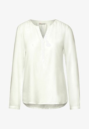 Valkoinen pitkähihainen pusero, jossa on v-pääntie, nappilista sekä sileä pinta, ja hieman kaareva helma alhaalla.