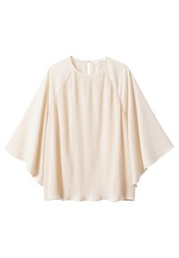 Beige plisseret bluse med høj hals, brede flagermusærmer og en nøglehulslukning bagpå, lavet af letvægts tekstureret stof.