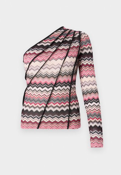 Knitted top with one long sleeve and asymmetrical design. Features a zigzag pattern in pink, black, and cream with textured fabric.