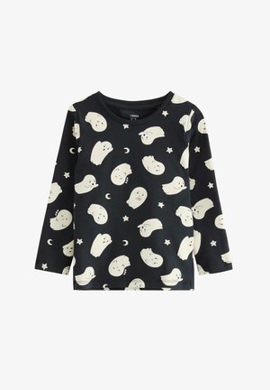 Langærmet sort skjorte med et gentaget mønster af hvide spøgelsesillustrationer samt små stjerner og halvmåner. Fremstillet af bomuld.