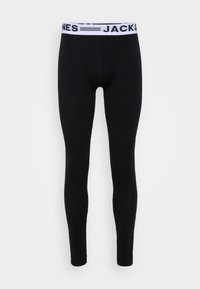 Schwarze Leggings aus einem weichen, dehnbaren Material. Mit einem weißen Bund, auf dem "JACK & JONES" in schwarzer Schrift gedruckt ist.