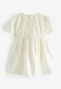 Crème-kleurige jurk met korte mouwen, met geplooide details en een elastische tailleband. Knoopsluiting aan de achterkant. Gladde textuur.