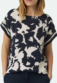 Schwarz-creamfarbene Bluse mit Blumenmuster, lockerer Passform, weitem Ausschnitt und kurzen Ärmeln, aus leichtem, glattem Stoff gefertigt.