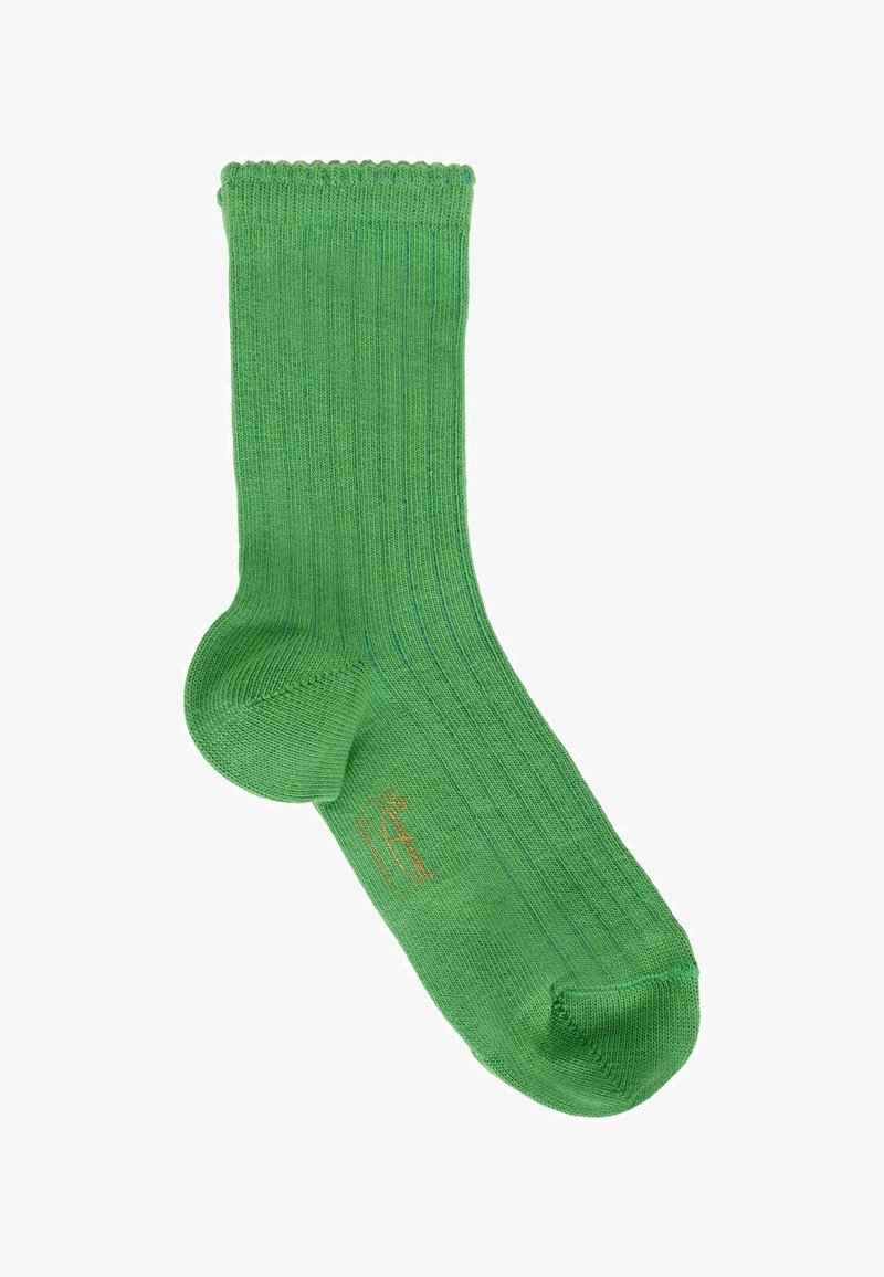 Zielona skarpetka kostkowa z żebrowanym wzorem, ozdobiona falbaniastym wykończeniem i subtelnymi niebieskimi paskami. Wykonana z miękkiego materiału, z wzmocnionym palcem i piętą.