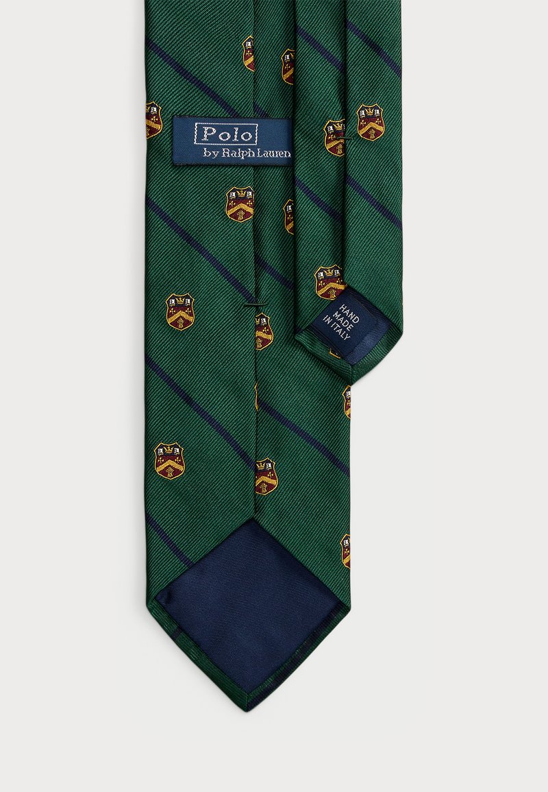 Grüne Krawatte mit diagonalen marineblauen Streifen und sich wiederholendem goldenen Wappenmuster. Hat eine einfarbige marineblaue Spitze und ein Etikett mit der Aufschrift "Polo von Ralph Lauren."
