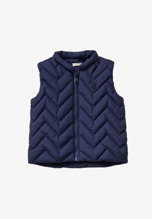 Marineblauer Steppweste mit einem Chevron-Quiltmuster, hohem Kragen und einem Frontreißverschluss. Mit einem kleinen, gestickten Logo an der Seite.