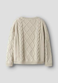 Maglione a trecce crema con motivi a rombi e treccia testurizzati. Collo rotondo e polsini e orlo a coste. Morbido materiale misto lana.