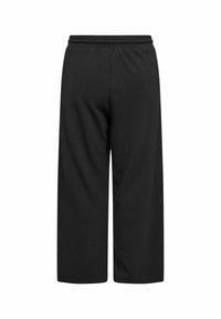 Černé, ke kolenům sahající culoty s elastickým pasem, vyrobené z měkké látky. Jednoduchý design bez viditelných vzorů nebo tónů.