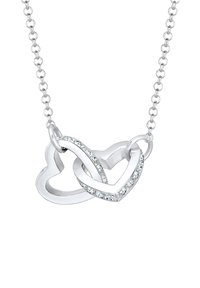 Silberne Halskette mit miteinander verflochtenen Herzen, eines davon mit vielen kleinen klaren Steinen besetzt, elegantes Kettendesign, polierte Oberfläche.