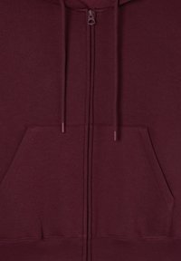 Felpa bordeaux con zip realizzato in un tessuto morbido, con tasca a marsupio, cappuccio con cordino e polsini e orlo a costine.