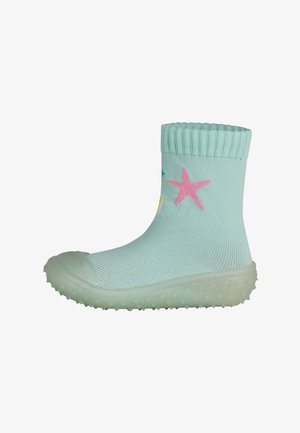 A mint green sock boot with a ribbed cuff. Features colorful star designs in pink, blue, and yellow. Textured rubber sole with dots.